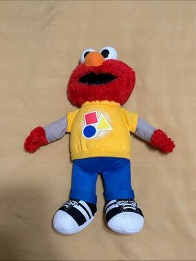 Sesame Street Elmo Plush in Red, Yellow, Blue